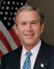 President George W. Bush poses for his official portrait in the Roosevelt Room of the White House, January 14, 2004. (P25695-23)