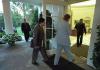 Counselor Karen Hughes and Counsel Alberto Gonzales follow President George W. Bush into the Oval Office, September 11, 2001. (P7110-08)