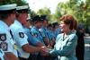 Mrs. Laura Bush greets firefighters and police, September 17, 2001, at a memorial service for victims of United Flight 93 at the Indian Lake Resort in Central City, Pennsylvania. (P7475-05a)