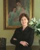 Mrs. Laura Bush poses in front of Mary Cassatt's painting,