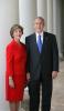 President George W. Bush and Mrs. Laura Bush pose for their official portrait, October 25, 2005, on the Colonnade of the White House. (P102505ED-0102)