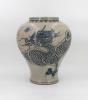 Speckled-brown vase decorated in blue with a continuous five clawed dragon and scattered flaming pearl devices. The form features a straight wide neck with a collared rim, made by Park, Kung Sun; signed on bottom. Gifted by Roh Moo-hyun, President of the Republic of Korea.