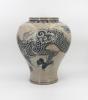 Speckled-brown vase decorated in blue with a continuous five clawed dragon and scattered flaming pearl devices. The form features a straight wide neck with a collared rim, made by Park, Kung Sun; signed on bottom. Gifted by Roh Moo-hyun, President of the Republic of Korea.