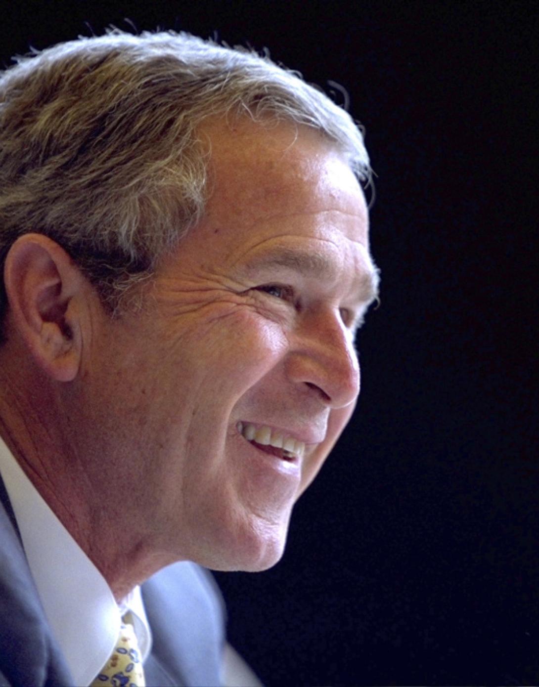President George W. Bush smiles as he participates in a Roundtable with Service Providers, July 1, 2002, in Cleveland, Ohio. (P19237-19A)