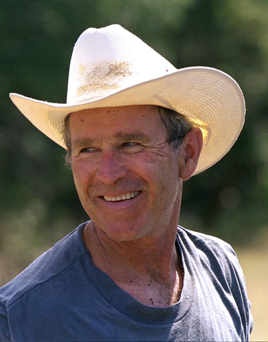 President George W. Bush at work clearing brush, August 28, 2002, at Prairie Chapel Ranch in Crawford, Texas.  (P20914-13)