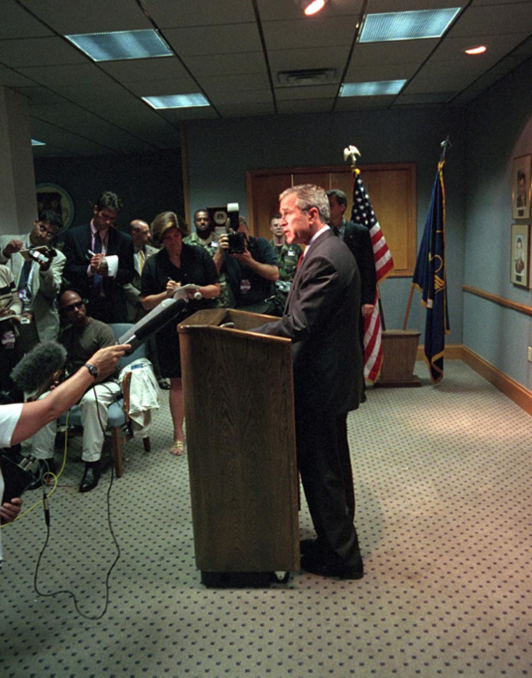 President George W. Bush delivers remarks on the terrorist attacks, September 11, 2001, from Barksdale Air Force Base in Louisiana, before departing for Offutt Air Force Base in Nebraska. (P7078-04)