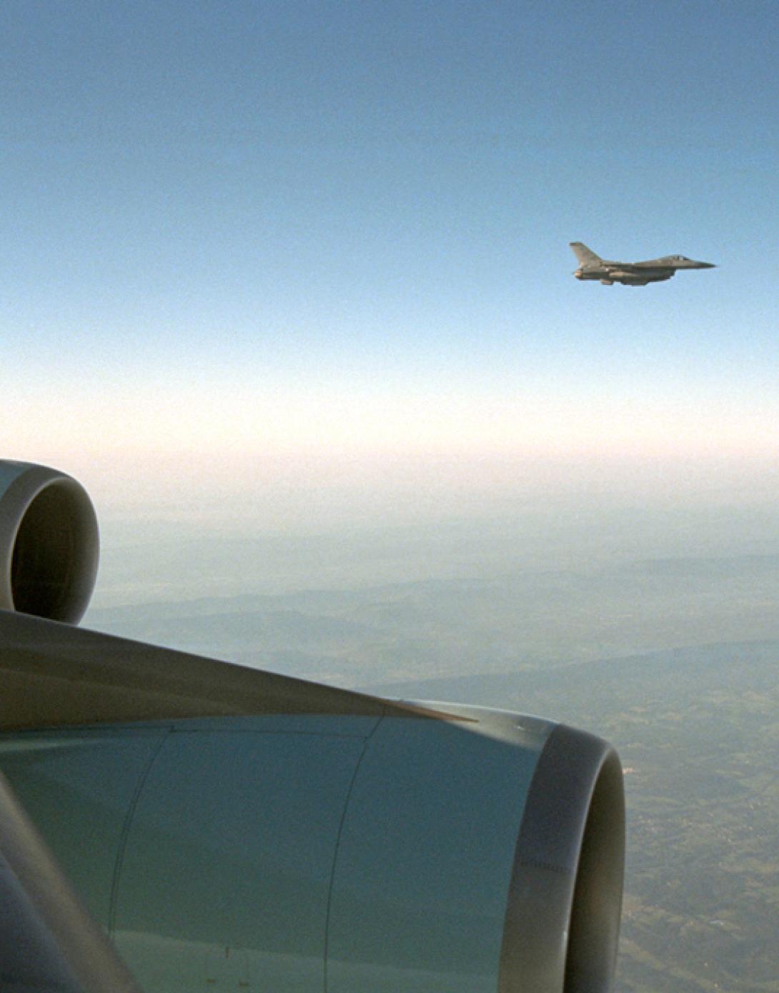 An F-16 escorts Air Force One, September 11, 2001, from Offutt Air Force Base in Nebraska to Andrews Air Force Base. (P7099-18)