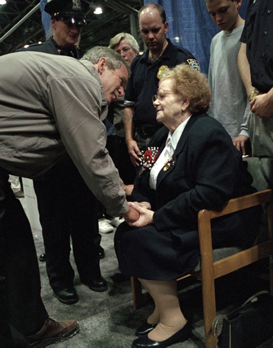 President George W. Bush talks with Arlene Howard on September 14, 2001, as he greets family members of victims of the World Trade Center disaster in New York City. (P7385-16)