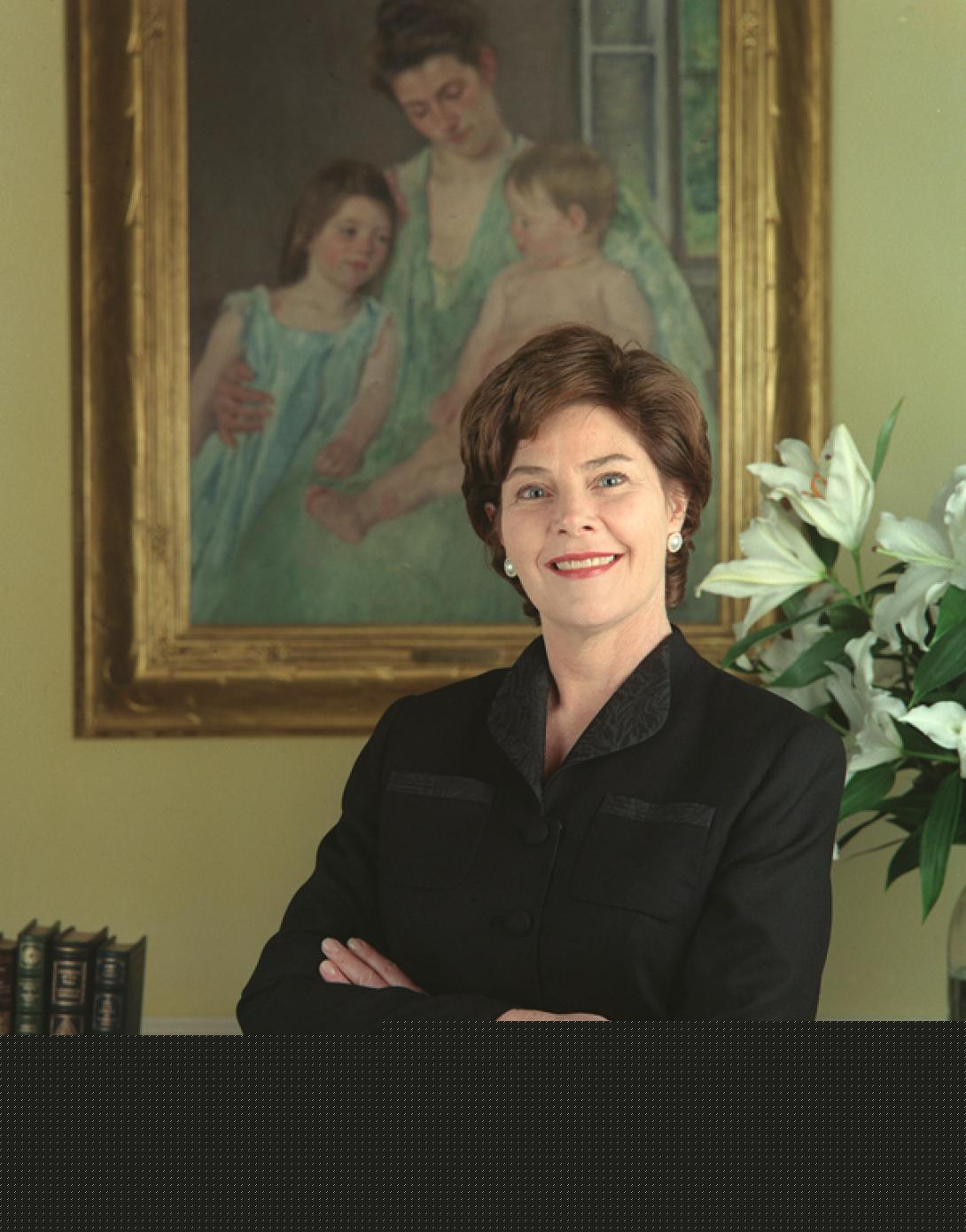 Mrs. Laura Bush poses in front of Mary Cassatt's painting,