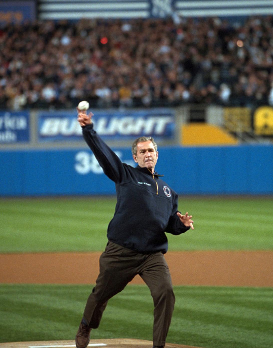 President George W. Bush throws out the ceremonial first pitch, October 30, 2001, at Yankee Stadium before Game Three of the World Series. (P9154-14)