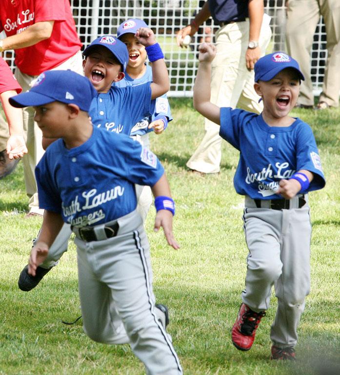 Players celebrate at the conclusion of the season opener game.