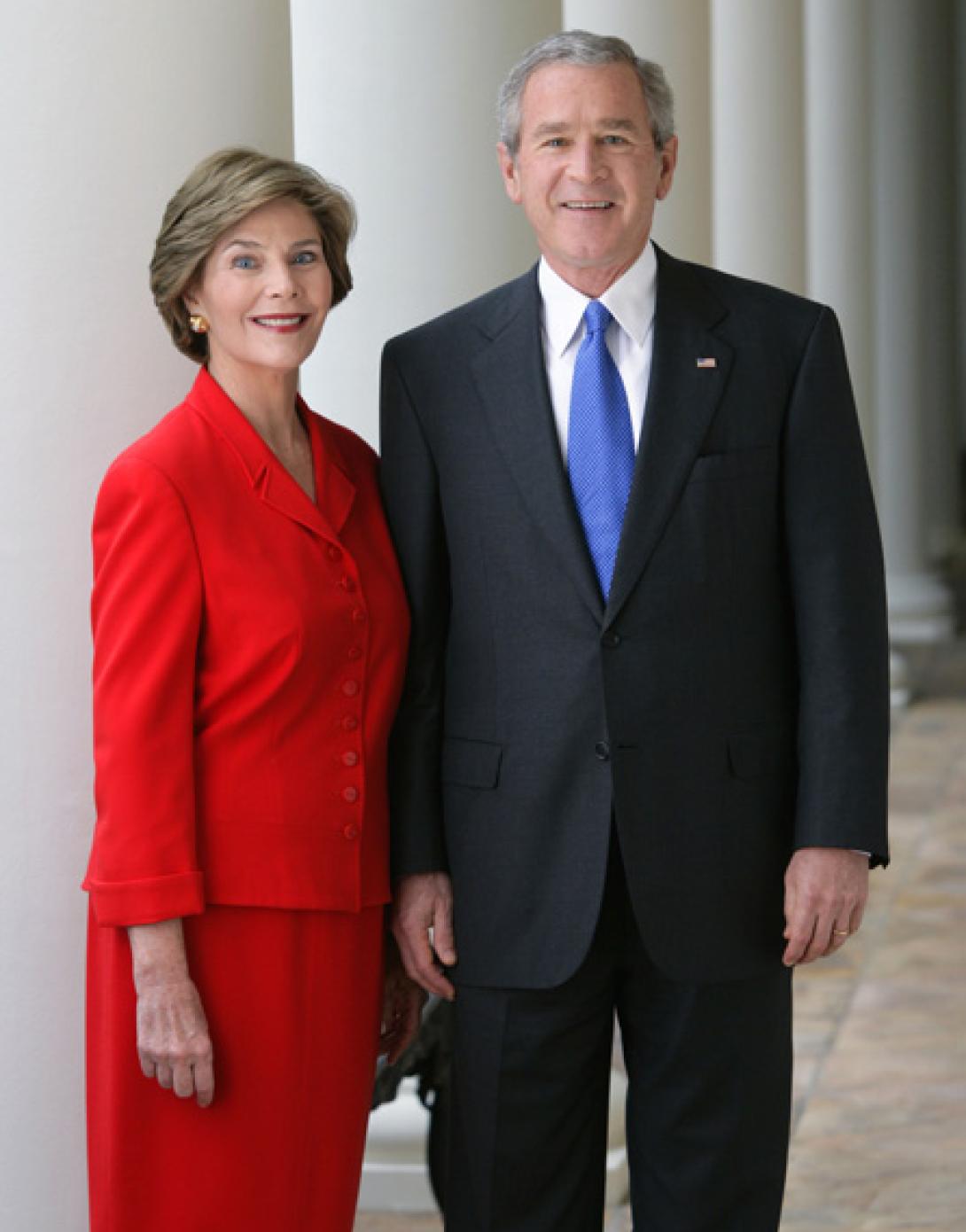 President George W. Bush and Mrs. Laura Bush pose for their official portrait, October 25, 2005, on the Colonnade of the White House. (P102505ED-0102)