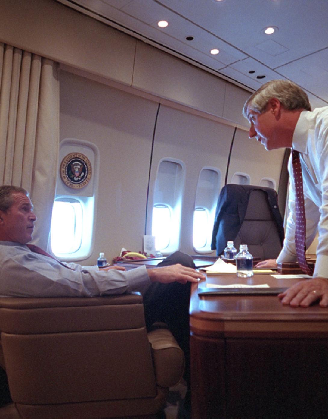 President George W. Bush speaks with White House Chief of Staff Andy Card, September 11, 2001, aboard Air Force One. (P7070-13)