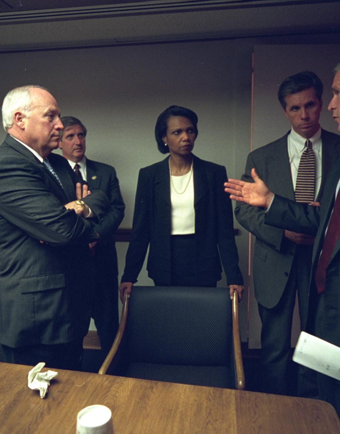 After returning to the White House, September 11, 2001, President George W. Bush meets with advisors in the Presidential Emergency Operations Center in the White House.