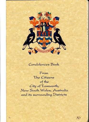 This photograph of a spread of condolence books sent in from Australia illustrates the abundance and variety of books sent in from throughout the world.
