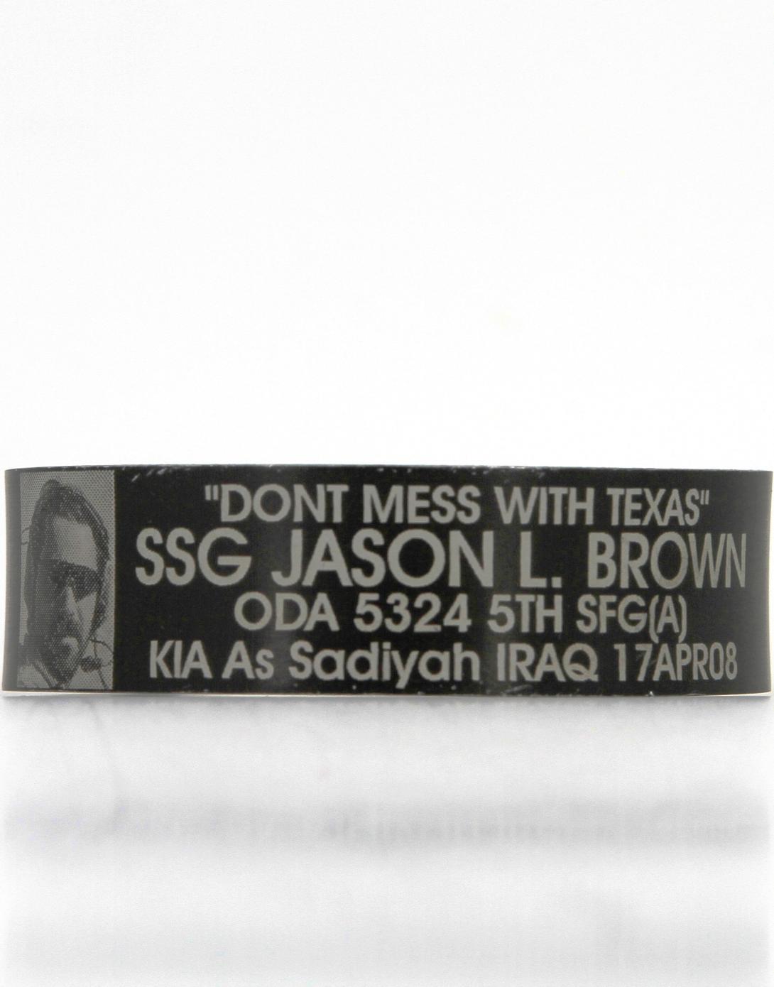 Black metal bracelet engraved with "Don't Mess with Texas - SSG Jason L. Brown - ODA 5324 5th SFG (A) - KIA As Sadiyah Iraq - 17APR08."