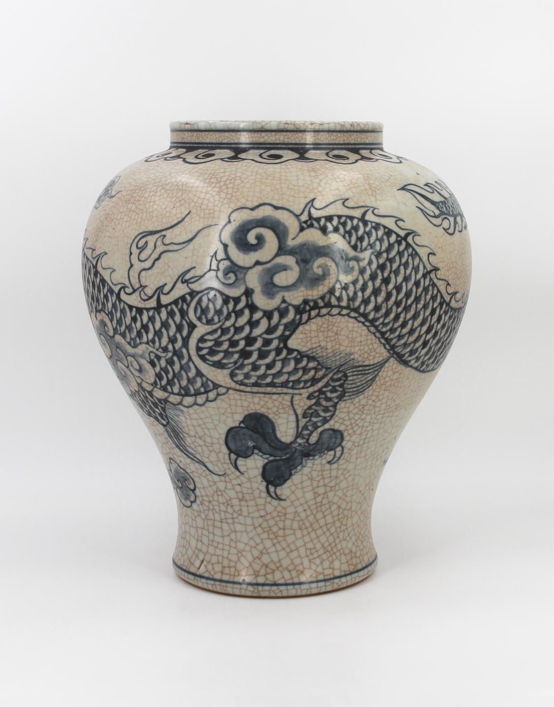 Speckled-brown vase decorated in blue with a continuous five clawed dragon and scattered flaming pearl devices. The form features a straight wide neck with a collared rim, made by Park, Kung Sun; signed on bottom. Gifted by Roh Moo-hyun, President of the Republic of Korea.