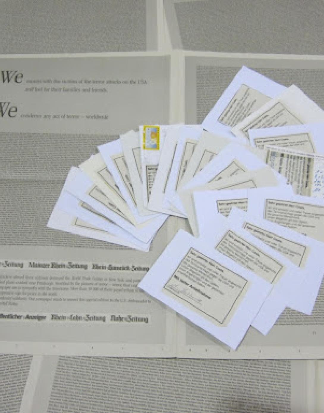 In the aftermath of September 11th, eight German newspapers printed condolence messages that their readers could cut out, adhere to postcards, and mail to the United States Ambassador Daniel Coats in Berlin.  Over 30,000 people participated in this outpouring of sympathy.