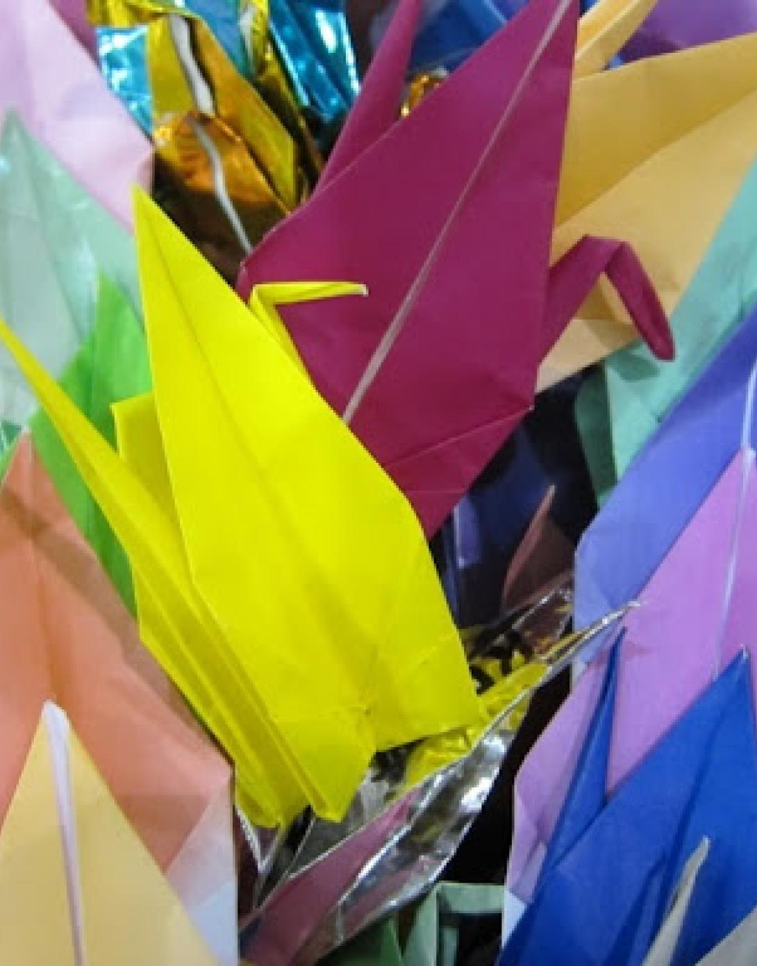 In Japan there is a tradition of folding one thousand origami paper cranes and stringing them together to have a wish granted by a crane. The students of Tamagawa School assembled three thousand cranes! 