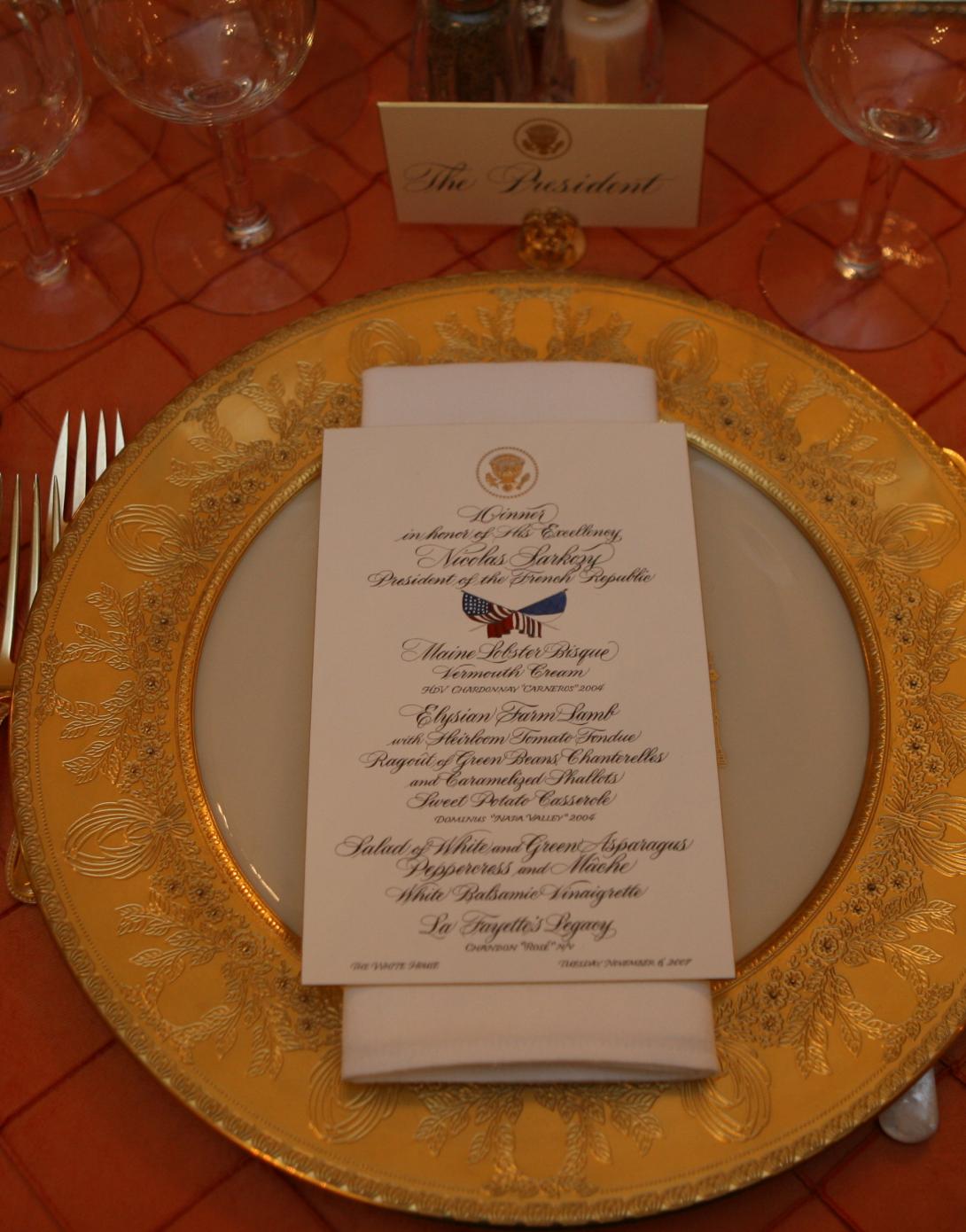 The dinner setting for President George W. Bush is seen, November 6, 2007, in the State Dining Room of the White House for the dinner in honor of French President Nicolas Sarkozy.