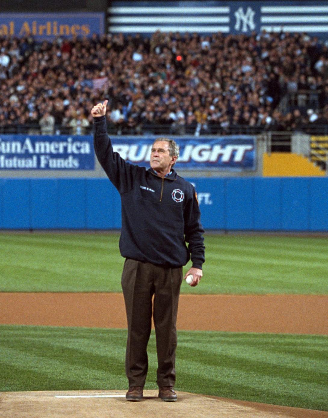 President George W. Bush gives a thumbs-up as he stands on the mound at Yankee Stadium.