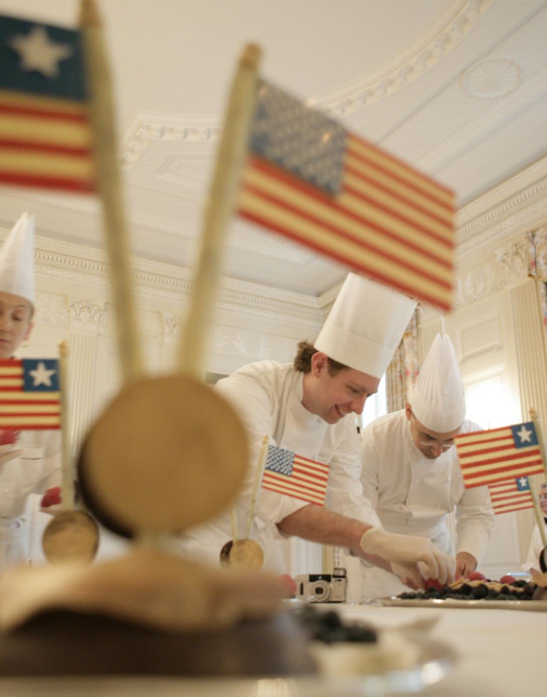 White House residence staff prepare desserts for a social lunch honoring President Ellen Johnson Sirleaf of Liberia at the White House, March 21, 2006.