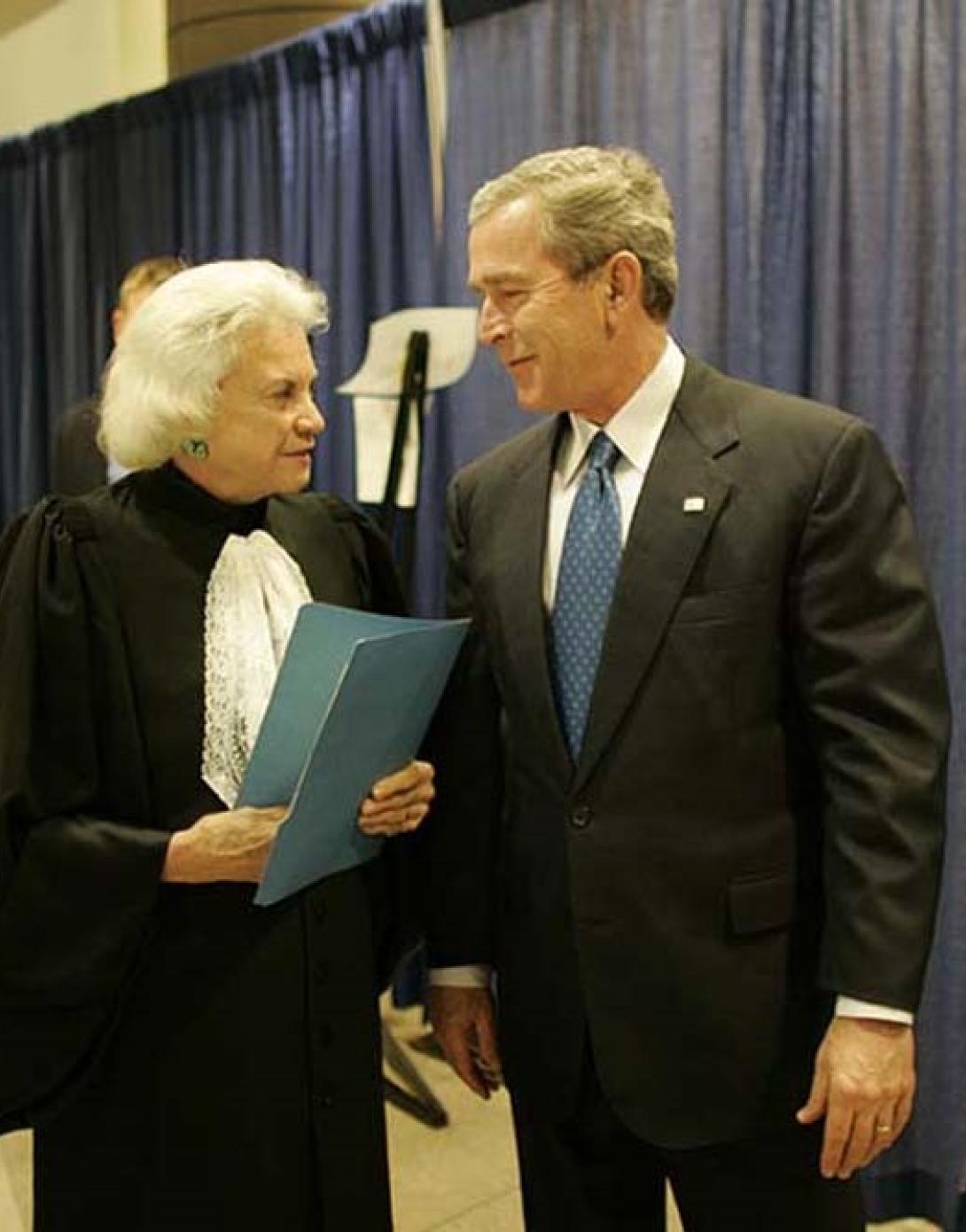 President George W. Bush and Supreme Court Justice Sandra Day O’Connor Talk Backstage at the Swearing-In Ceremony for the Secretary of Homeland Security, March 3, 2005.