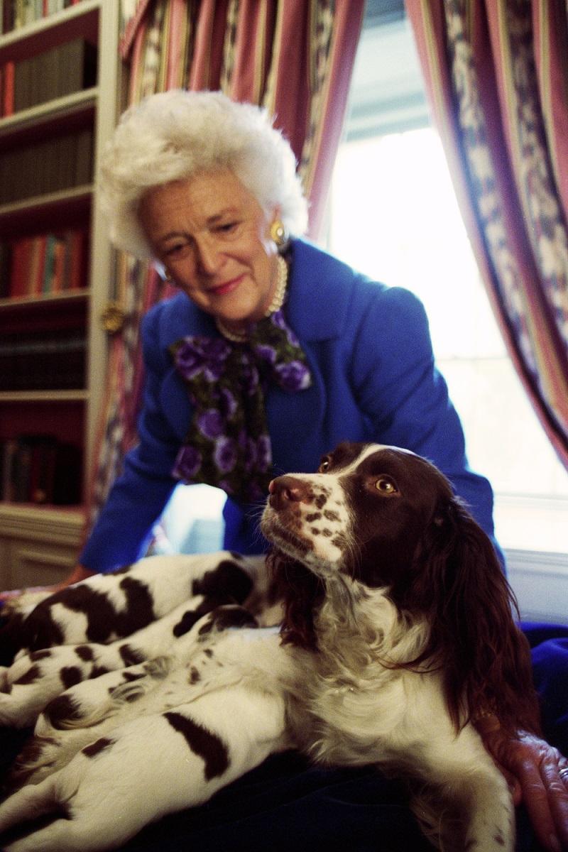 Mrs. Barbara Bush with Millie and her puppies at the White House, April 3, 1989. George Bush Presidential Library and Museum. P01791-14.